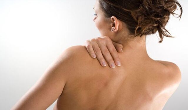A woman is concerned about pain under her left shoulder blade from behind